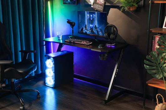 The G-Lab K-Desk Yttrium gaming desk in a room setup